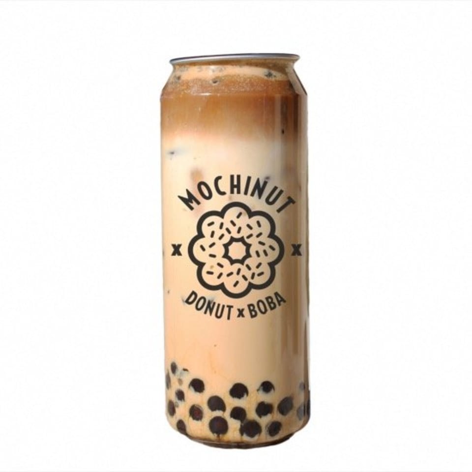 A MochiNut donut and boba drink in a clear can with a black logo, against a white background.